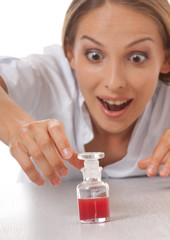 Obraz na płótnie Canvas woman doctor or nurse with medication in bottle