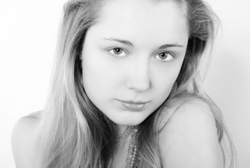 Naklejka premium Portrait of the beautiful girl in costume jewellery