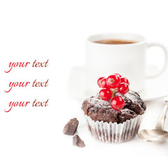 Chocolate cake with berries and a cup of coffee