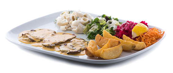 Cafe de Paris style steak with salad and pasta on the side