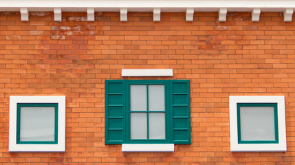 White window on a brick wall