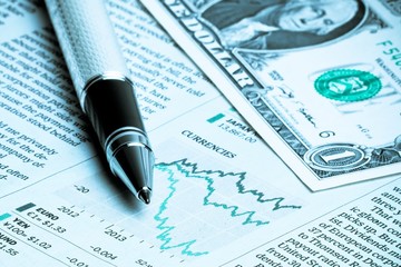 detail of a business pen near one dollar