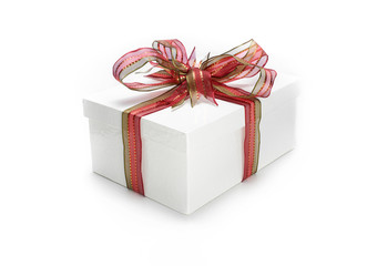 Christmas present wrapped with a red ribbon and bow.