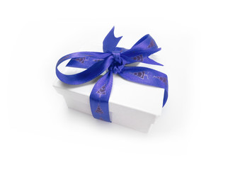 Christmas present wrapped with a blue ribbon and bow.