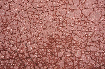 Naklejka premium Hintergrund aus gerissenem Asphalt
