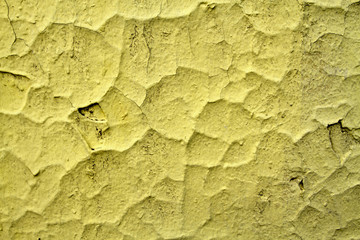 dark yellow cracked wall