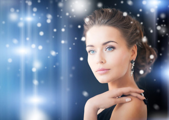 woman with diamond earrings