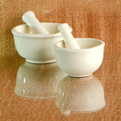 Porcelain medicine grinder.