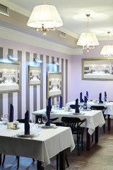 Row of tables and lamps with shades