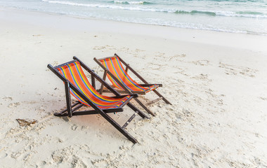 Fototapeta na wymiar canvas chair at the beach