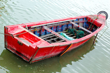Fototapeta na wymiar Old wooden boat at sea.