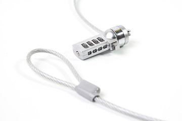 Laptop Notebook security lock sling hard steel cable close up isolate on white background