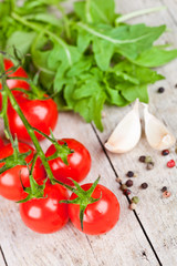 fresh tomatoes, rucola, garlic and peppercorns