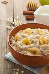bowl of oatmeal on wood