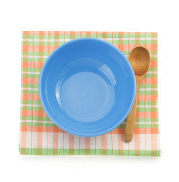 plate and spoon on white