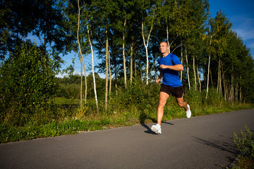 Healthy lifestyle - young man running
