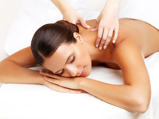 Massage. Close-up of a Beautiful Woman Getting Spa Treatment