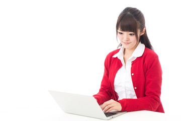 attractive asian woman using laptop