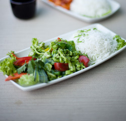 Japanese food. Chicken with rice and vegetables