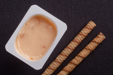 Rolled waffles and yogurt