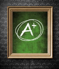 A plus grade chalkboard in old wooden frame