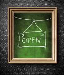 Open sign chalkboard in old wooden frame