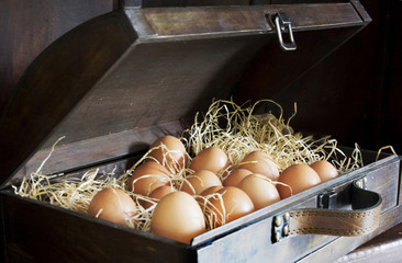 Eggs in a wooden chest