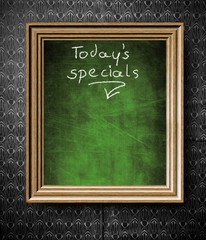 Todays special with copy-space chalkboard in old wooden frame