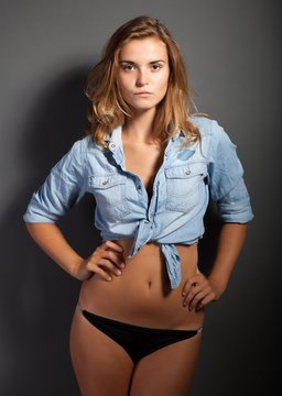 Hot natural woman body in jeans shirt jacket and panties