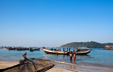 Fishermen with nets at Ngapali beach, Myanmar