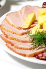 Tasty smoked meat with dill and vegetables