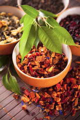 Various dry tea in small bowls