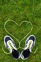 Sneakers on grass with heart
