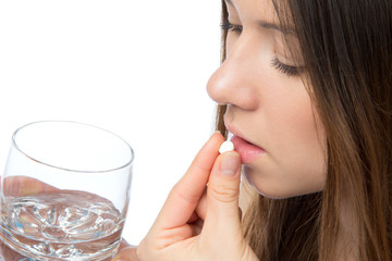 Woman with headache hand take pill medicine tablet