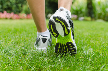Woman running on grass