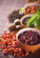 Various dry tea in small bowls