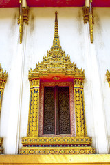 thai art windows in temple of thailan