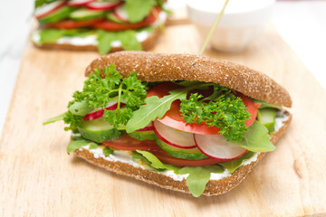 Healthy food, sandwich with cottage cheese, greens and vegetable