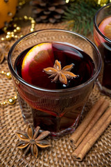 mulled wine with spices in glasses, top view