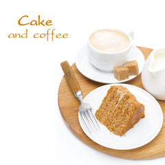 piece of honey cake, fresh cream and cup of cappuccino on board