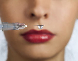 Obraz premium Woman with syringe