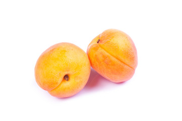 Ripe apricot fruit isolated on white background.