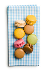 colorful macaroons on checkered napkin