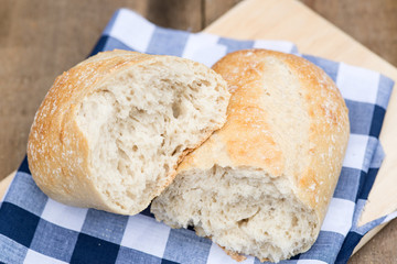 Loaf of sourdough bread in rustic kitchend setting