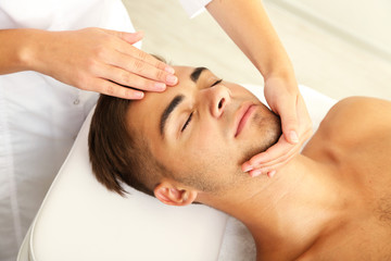 Obraz na płótnie Canvas Man having head massage close up