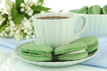 Coffee and macaroons close-up