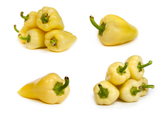 set of yellow bell peppers isolated on white