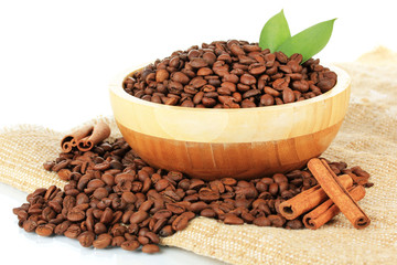 Coffee beans in bowl on white background
