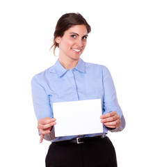 Attractive young woman holding a blank card