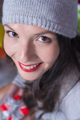 Beautiful woman in a winter cap